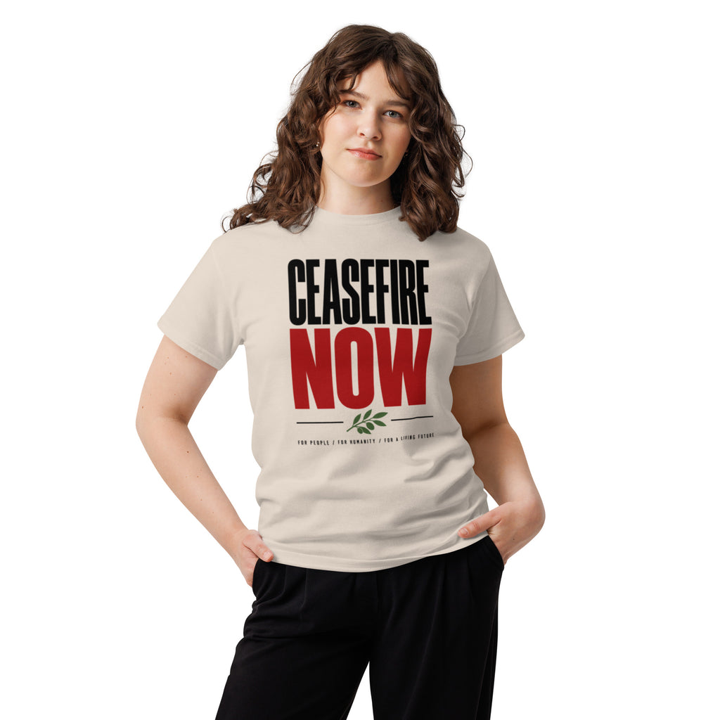 Model wearing the natural-color Ceasefire Now T-shirt